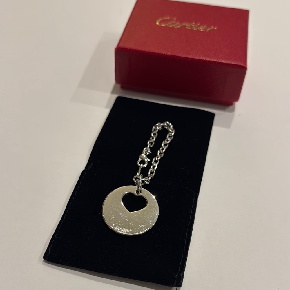 Cartier Pre own Heart Bag Charm with Dust Bag & Box( few hairline scratches)